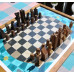 Jeu d'échecs et échiquier créés par l'artiste suisse Thierry Hunziker, en parfait état