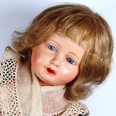 Centenary Petitcollin doll in fair condition, 1920s