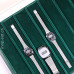 Presentation case for watches or jewels, dark green, 8 compartments, in very good condition
