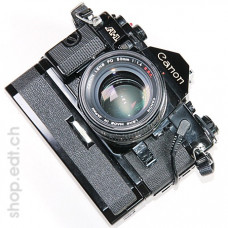 Canon A-1 with FD lens 50 mm 1:1.4 S.S.C.*, power winder and date stamper, 24x36 analog camera of 1980